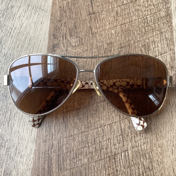 Coach Christina Women’s Prescription Sunglasses HC 7047 (L103) T Designer Logo main image 9